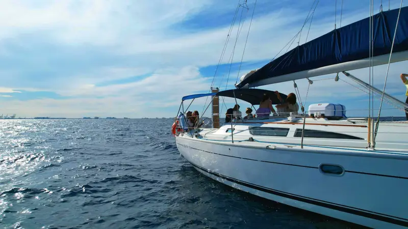 Alegria sailing yacht anchored in turquoise waters near a hidden cove in Andratx